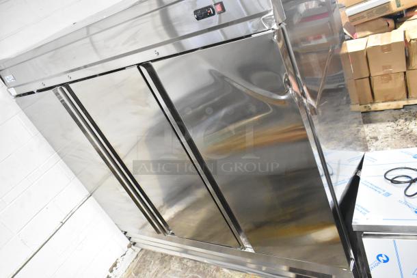 BRAND NEW SCRATCH AND DENT! 2025 Avantco 178SS3FHC Stainless Steel 3 Door Reach In Freezer w/ Poly Coated Racks. 115 Volts, 1 Phase. - Image 2 of 10