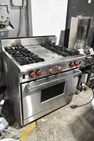 Wolf Gourmet Stainless Steel Commercial Gas Powered 4 Burner Range w/ Convection Oven.