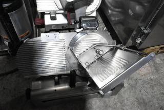 Globe Stainless Steel Commercial Countertop Meat Slicer w/ Blade Sharpener. 115 Volts, 1 Phase. - Item #1194698
