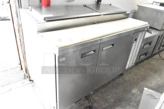Delfield 18660PTB Stainless Steel Commercial Pizza Prep Table on Commercial Casters. 115 Volts, 1 Phase.