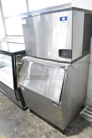 Manitowoc IY0504A-161 Stainless Steel Commercial Ice Head on Follett 425-30 Stainless Steel Commercial Ice Bin. 115 Volts, 1 Phase.