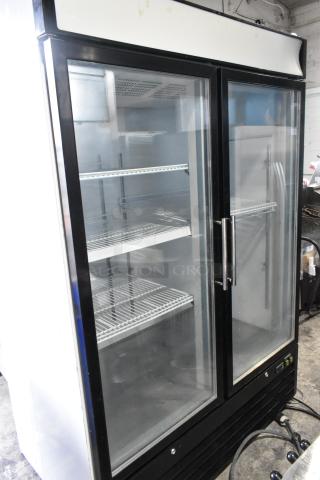 Polar GE019 Metal Commercial 2 Door Reach In Cooler Merchandiser w/ Poly Coated Racks. 115 Volts, 1 Phase.
