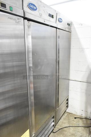 Entree CR1 Stainless Steel Commercial Single Door Reach In Cooler w/ Poly Coated Racks on Commercial Casters. 115 Volts, 1 Phase.