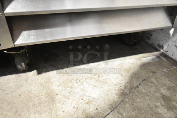 Entree CR1 Stainless Steel Commercial Single Door Reach In Cooler w/ Poly Coated Racks on Commercial Casters. 115 Volts, 1 Phase. - Image 4 of 4