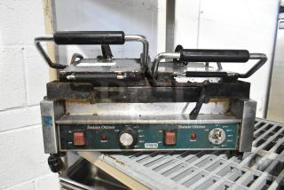 Waring WFG300 Stainless Steel Commercial Countertop Electric Powered Double Panini Press. 240 Volts, 1 Phase.