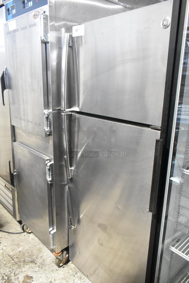 General Electric GE GTE18GSHBRSS stainless steel cooler with freezer, 115 volts, 1 phase, minor surface wear, model visible.
