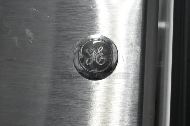 General Electric GTE18GSHBRSS stainless steel cooler with freezer, emblem on door, 115 volts, 1 phase.