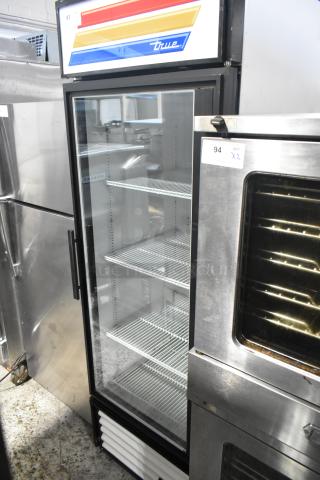 True GDM-23F Metal Commercial Single Door Reach In Freezer Merchandiser w/ Poly Coated Racks. 115 Volts, 1 Phase. - Item #1194984