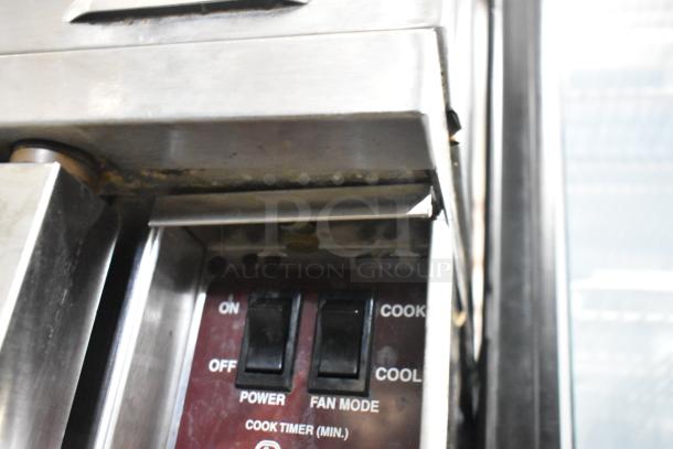Southbend SilverStar convection oven controls close-up showing power and fan mode switches; stainless steel finish.