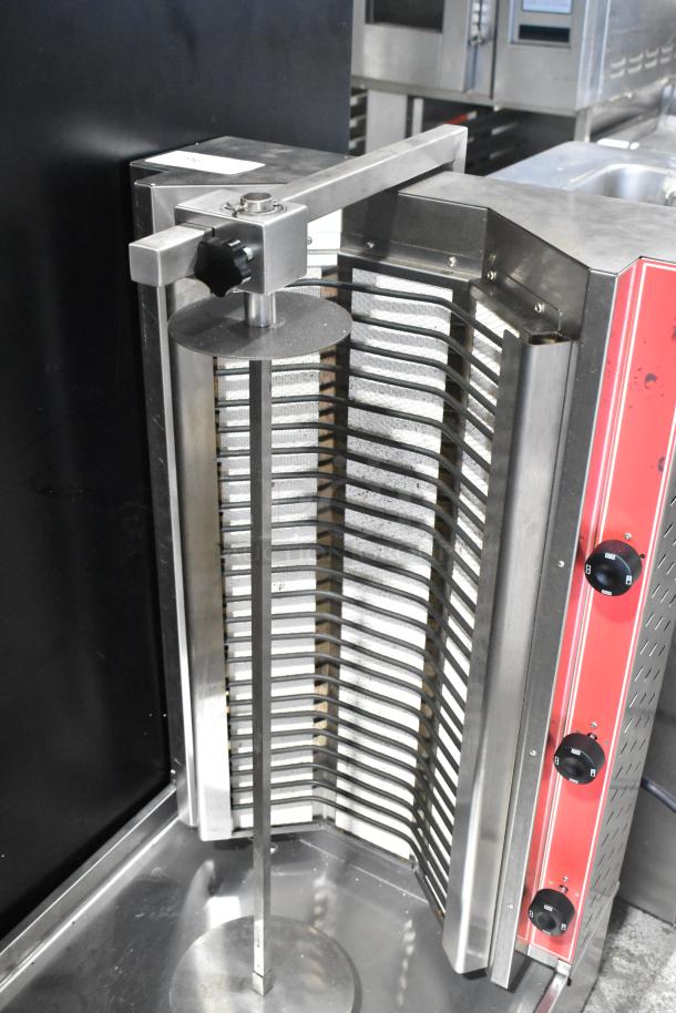 2024 Cookline 4E stainless steel countertop gyro machine, electric powered, 240 volts, with control knobs.