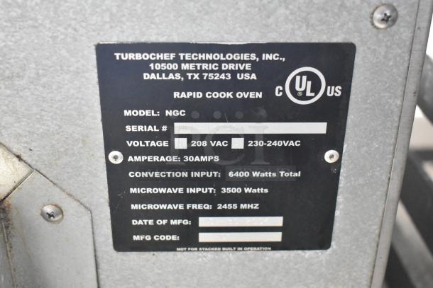 Turbochef NGC stainless steel rapid cook oven label detailing model, serial number, voltage, and wattage.