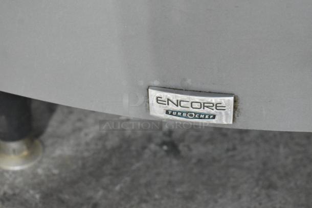 Turbochef Encore 2 rapid cook oven, metal finish, 208/230-240V, 1 Phase, featuring model label.