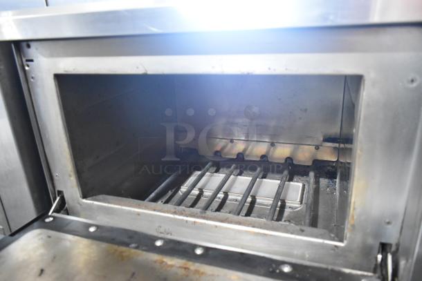 Turbochef NGC stainless steel rapid cook oven interior view, showing clean chamber and heating elements. 208/230-240V, 1 phase.