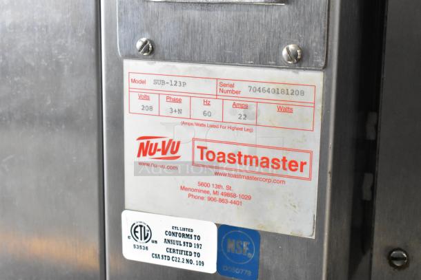 Nu Vu SUB-123P stainless steel commercial oven proofer on casters. 208 Volts, 3 Phase. Labels show model and certification info.