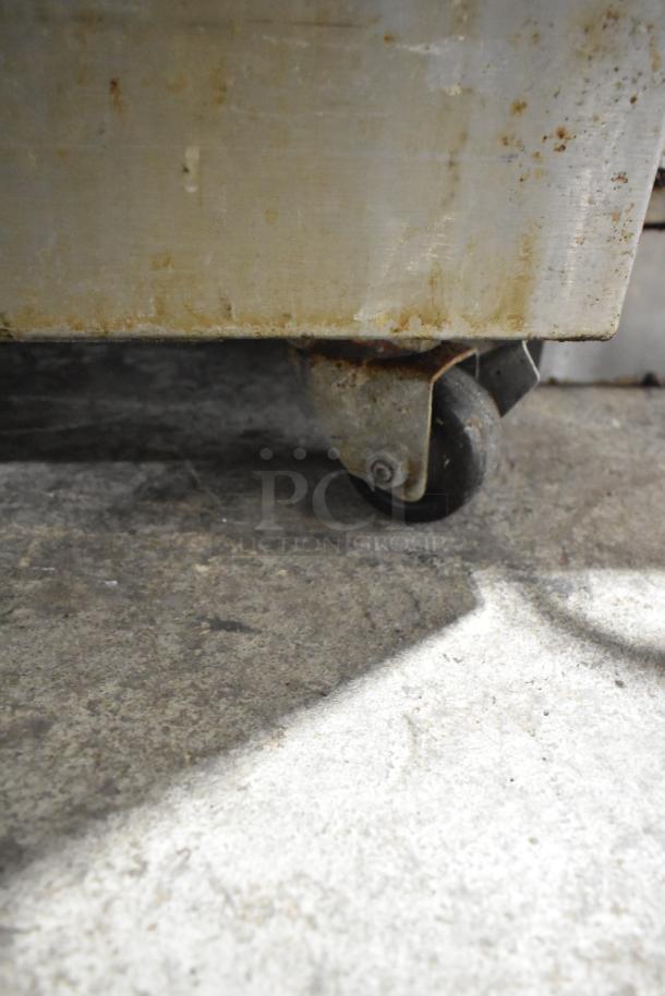 Duke TSC-6/18 stainless steel oven proofer, commercial casters visible, 208V, 3 phase, shows surface wear.