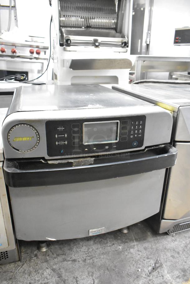 Turbochef ENC metal countertop rapid cook oven, electric, 208/240V, used, visible control panel, sturdy legs.