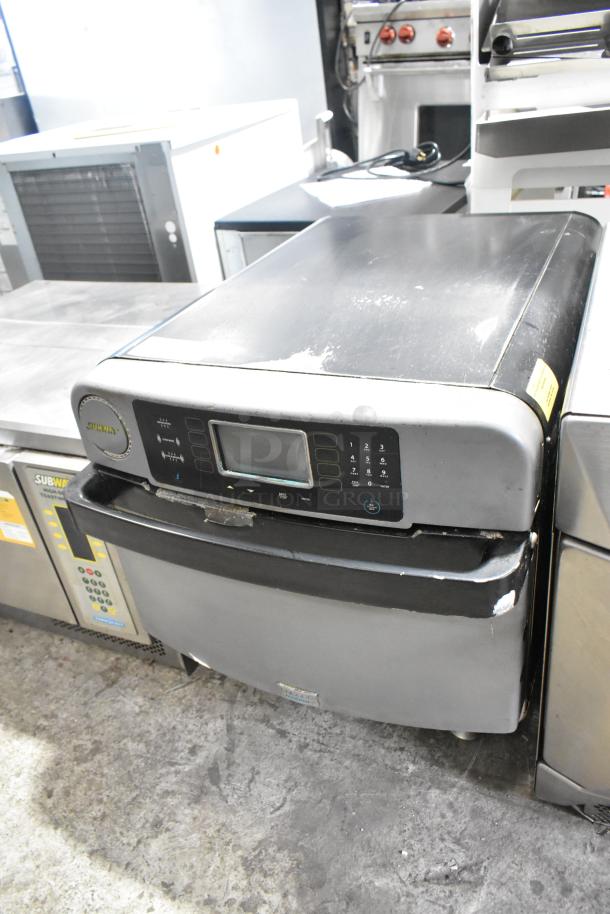 Turbochef ENC metal commercial countertop rapid cook oven, 208/240V, 1 phase, electric powered, with control panel, in used condition.