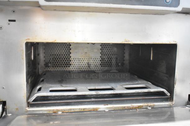 Turbochef ENC commercial countertop rapid cook oven, metal, used, 208/240 volts, 1 phase, interior view.