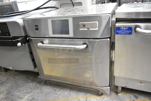 Merrychef eikon e4 stainless steel rapid cook oven, used condition, electric, 208/240 volts, 1 phase, with control panel.