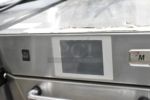Merrychef eikon e4 stainless steel rapid cook oven, 208/240V, 1 phase. Features touchscreen, visible wear on top edge.