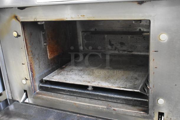 Merrychef eikon e4 rapid cook oven, stainless steel interior, used condition, electric, 208/240V, 1 phase.