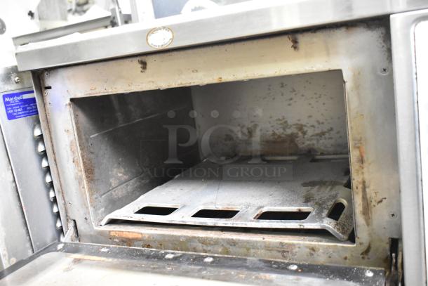 Turbochef NGC stainless steel rapid cook oven, commercial countertop model, showing interior wear. 208/230-240 volts, 1 phase.