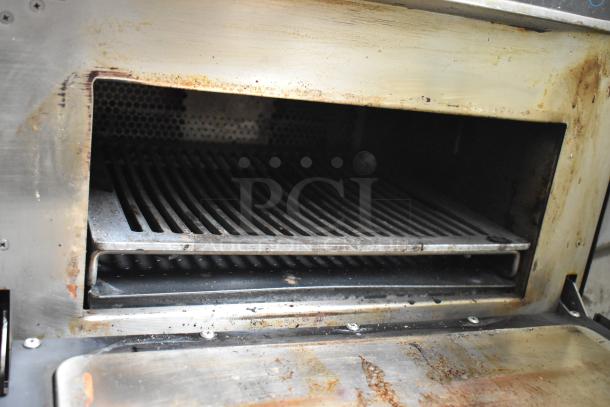 Turbochef Encore 2 metal commercial rapid cook oven, showing interior with grill rack. Used condition, 208/230-240 volts, 1 phase.