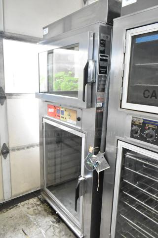 Nu Vu SUB-123P stainless steel commercial oven proofer on casters. 208V, 3 phase. Visible control panel and large viewing window.