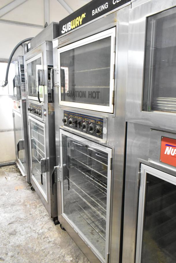Nu Vu SUB-123 stainless steel commercial oven proofer on casters. Features clear doors, control knobs, and safety labels. 120/208V, 3 phase.