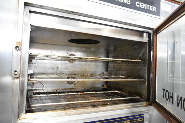 Nu Vu SUB-123 stainless steel oven proofer with interior racks, visible wear; 120/208V, 3 phase, on commercial casters.