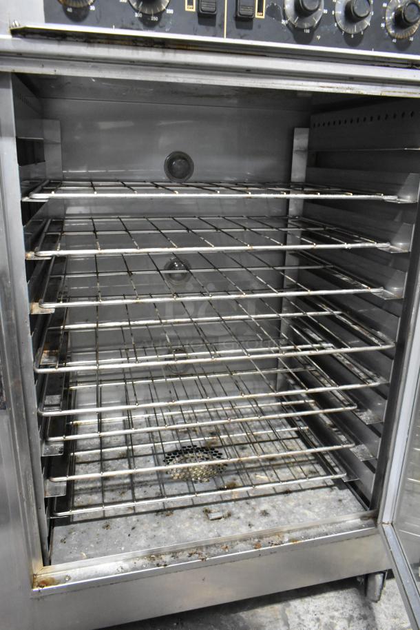 Nu Vu SUB-123 stainless steel commercial oven proofer, floor style, on casters. Features multiple racks, 120/208V, 3-phase power.