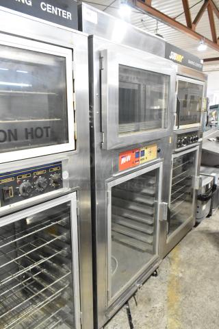 Nu Vu SUB-123P stainless steel commercial oven proofer with glass doors, control knobs, and caster wheels; 208V, 1 phase.
