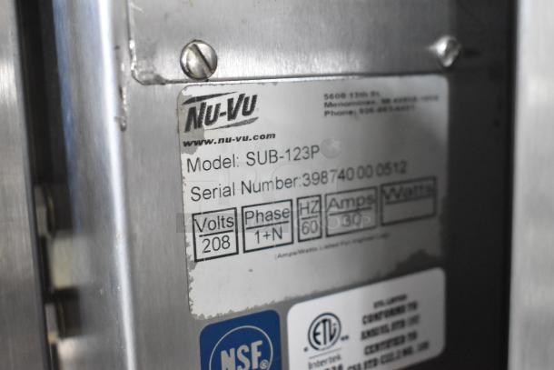 Nu Vu SUB-123P stainless steel oven proofer label, 208 volts, 1 phase. Shows model and serial number on commercial casters.
