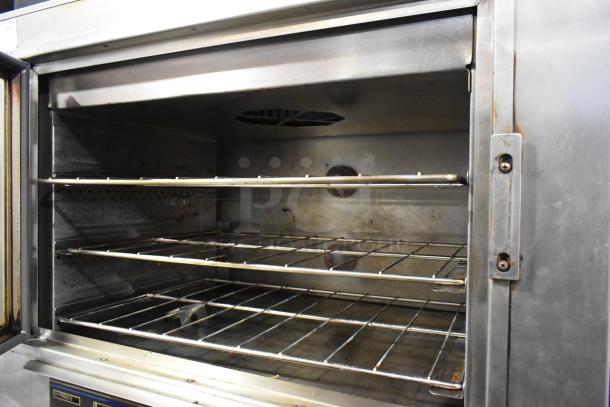 Nu Vu SUB-123 stainless steel oven proofer, three shelves, commercial casters, 208V, 3 phase, used condition.