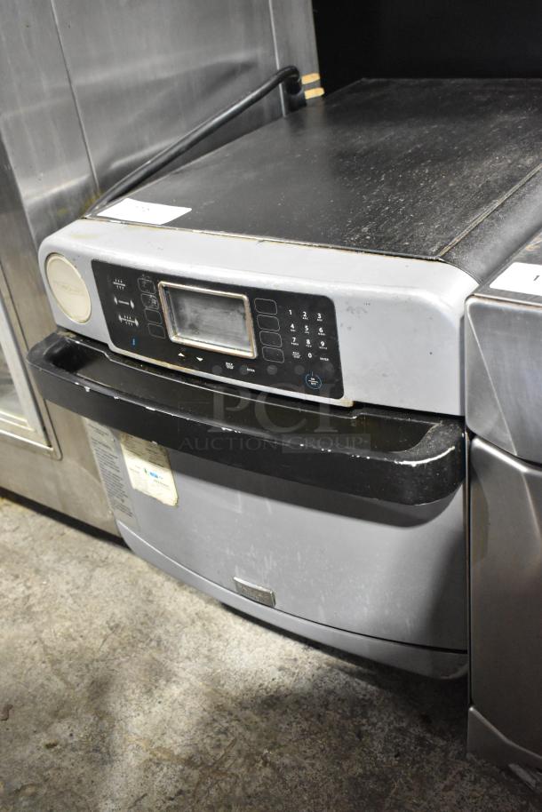 Turbochef ENC commercial rapid cook oven, electric, countertop model, metal exterior, 208/240V, visible wear.
