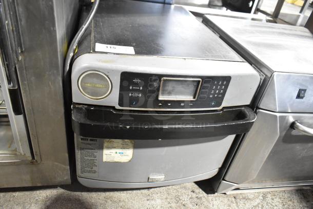 Turbochef ENC commercial countertop rapid cook oven, electric powered, 208/240V, 1 phase. Metal exterior with digital controls.