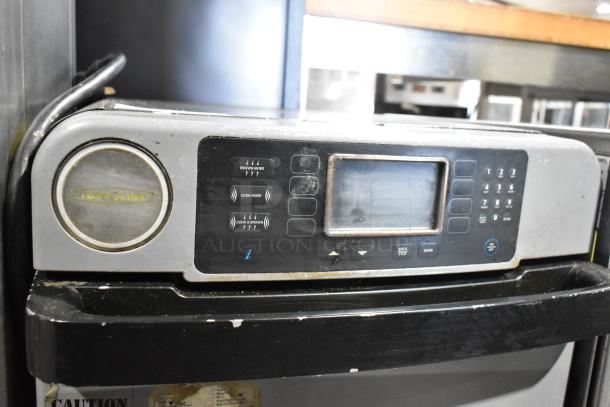 Turbochef ENC metal commercial rapid cook oven, electric, 208/240V, 1 phase. Features control panel and brand label. Used condition.
