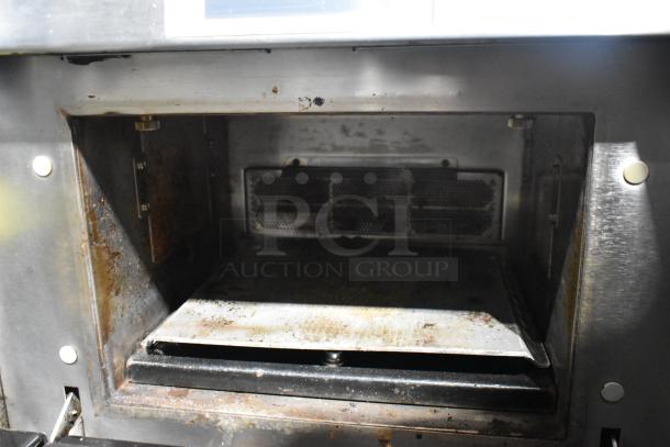 Merrychef eikon e4 stainless steel rapid cook oven, electric, 208/240V, 1 phase. Some interior wear visible.
