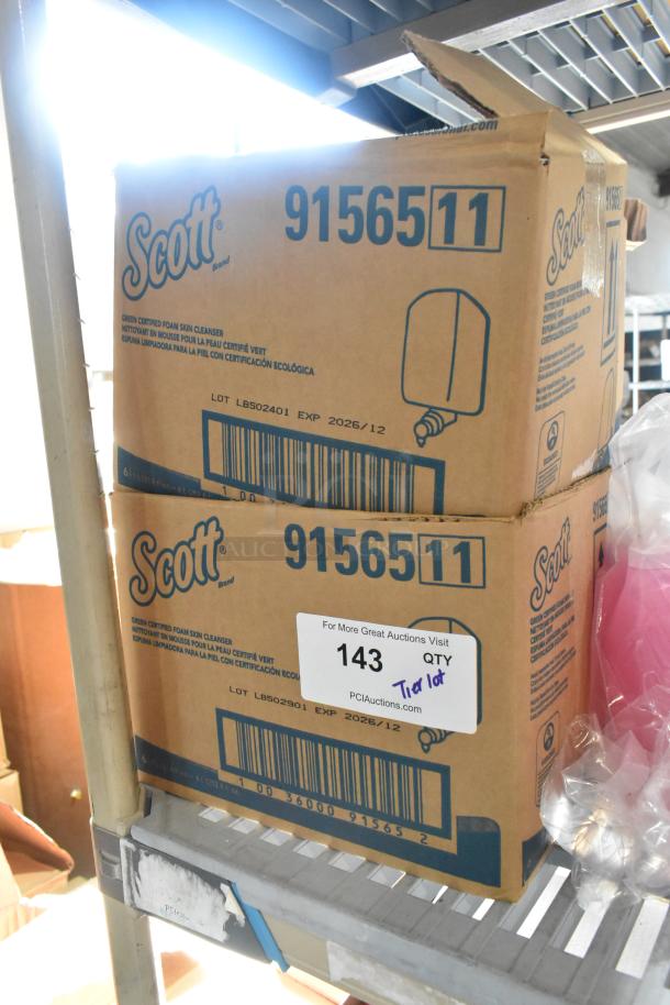 Boxes of Scott foam skin cleanser and soap dispenser refills, lot number LB502401, expiration 2026/12, auction label visible.