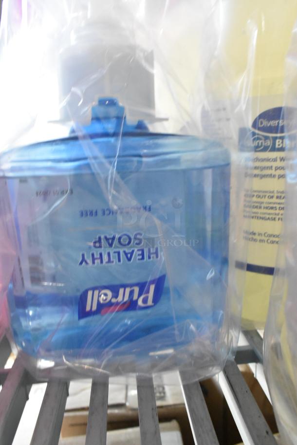 Tier lot featuring soap dispenser refills including Purell Healthy Soap, Scott Foam Skin Cleaner, in sealed condition.