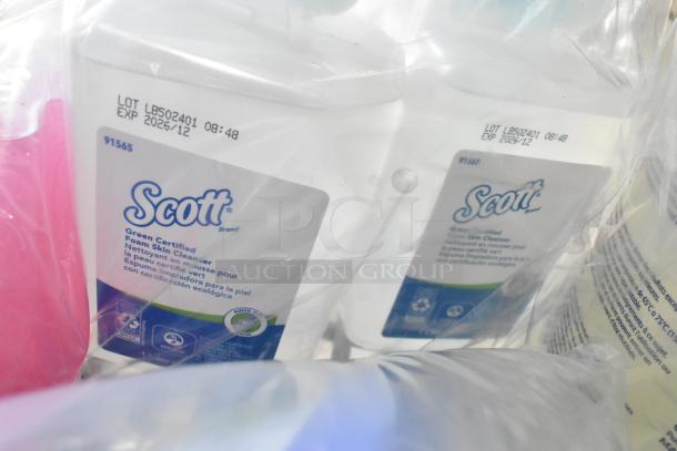 Tier lot featuring Scott soap dispenser refills, Pink Lotion Skin Cleanser, and Scott Foam Skin Cleaner, with visible labels and expiration dates.