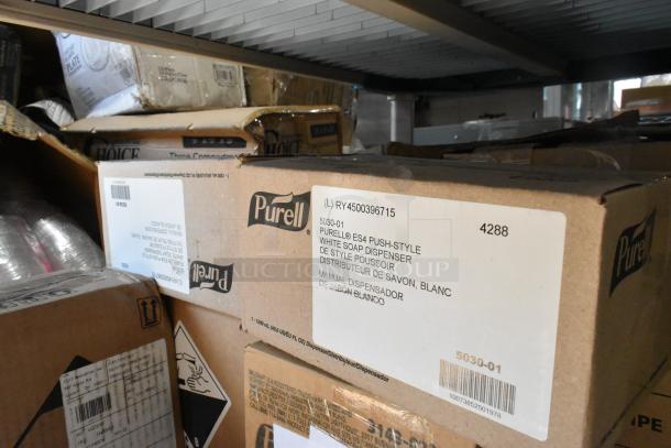 Tier lot featuring 3M red buffer pads, Purell ES4 white soap dispenser box, Diversey Glance cleaner. Ideal for bulk buyers.
