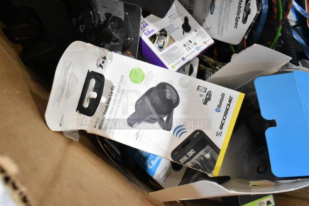 Tiered lot including car chargers, Zebra label rolls, and various accessories in original boxes, mixed condition.