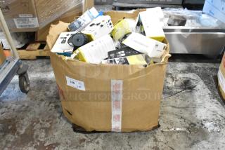 Large box with assorted items including phone mounts, various packaging visible. Box labeled "146, 1 Lot."