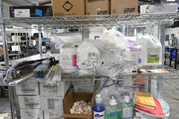 Tier lot of assorted items including CB antenna, CaviWipes, Scott foam skin cleanser, Diversey dry wipes, on shelves.