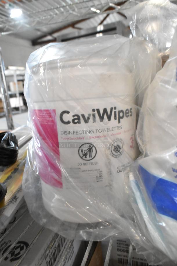 Lot with CaviWipes disinfecting towelettes, packaged, visible labels indicating tuberculocidal and bactericidal properties.