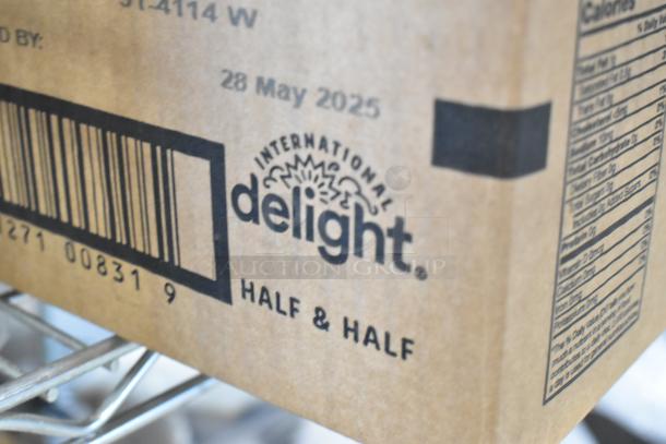 Cardboard box with "International Delight Half & Half," showing barcode and expiration date May 28, 2025.