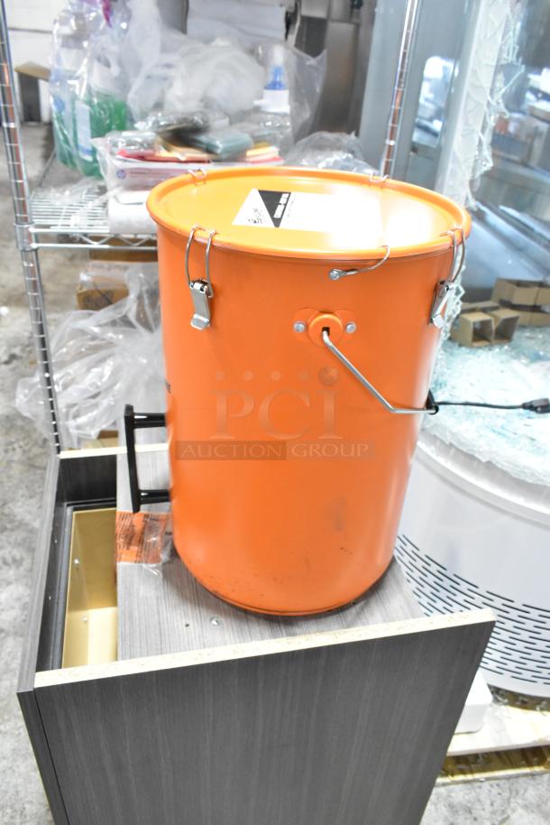 Brand new Fryclone 259FOPN6GL 6.5-gallon orange utility oil pail. Scratch and dent. Durable metal, secure lid, handle.