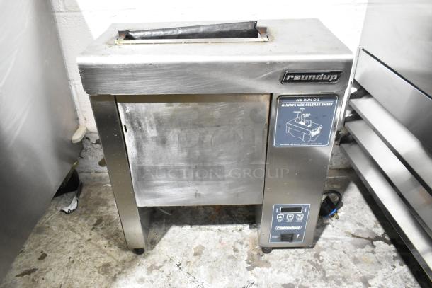 Roundup VCT-2000CS stainless steel commercial countertop vertical contact toaster, 208V, 1 phase, used condition.