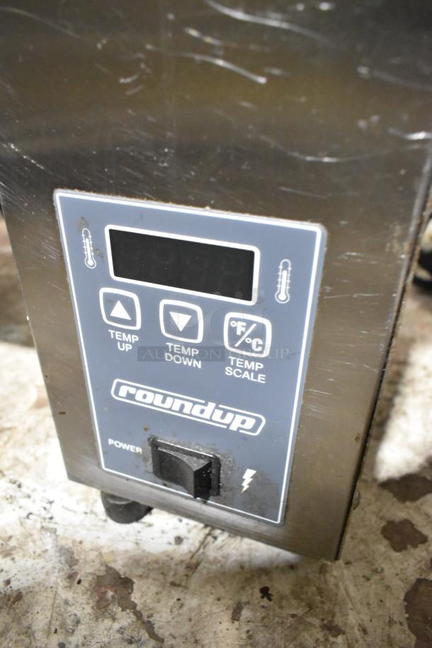 Roundup VCT-2000CS stainless steel commercial vertical contact toaster, features temp controls, 208 volts, 1 phase.
